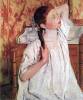 Girl Arranging Her Hair By Cassatt